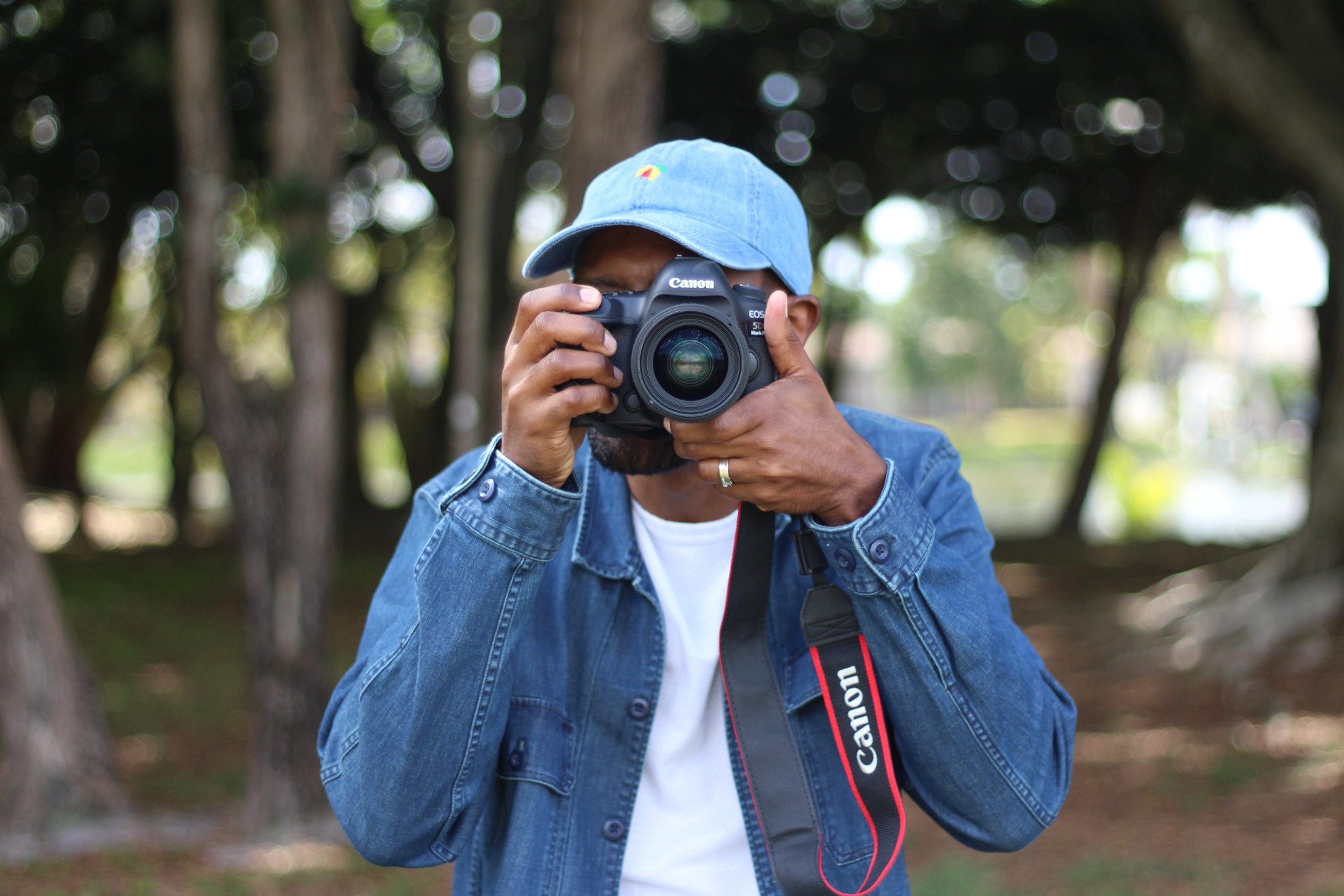 Nutmeg photographer taking a photo outdoors
