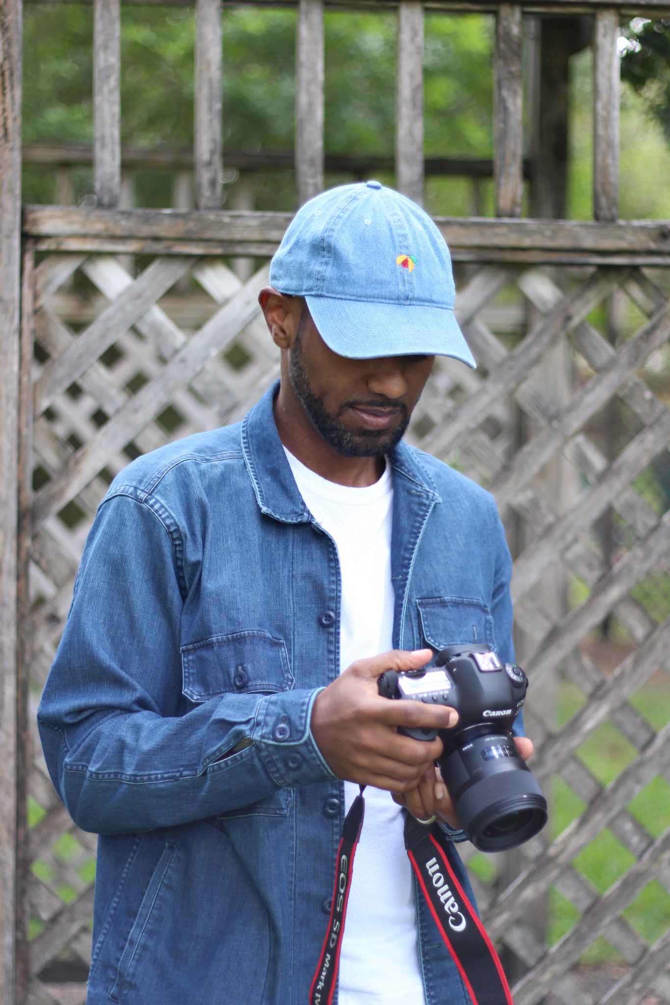 Nutmeg photographer reviewing camera